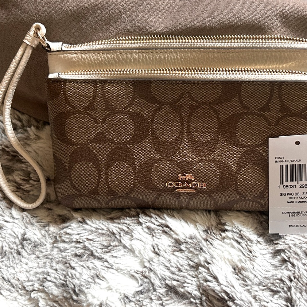 COACH 3 zipper wallet NWT never used.